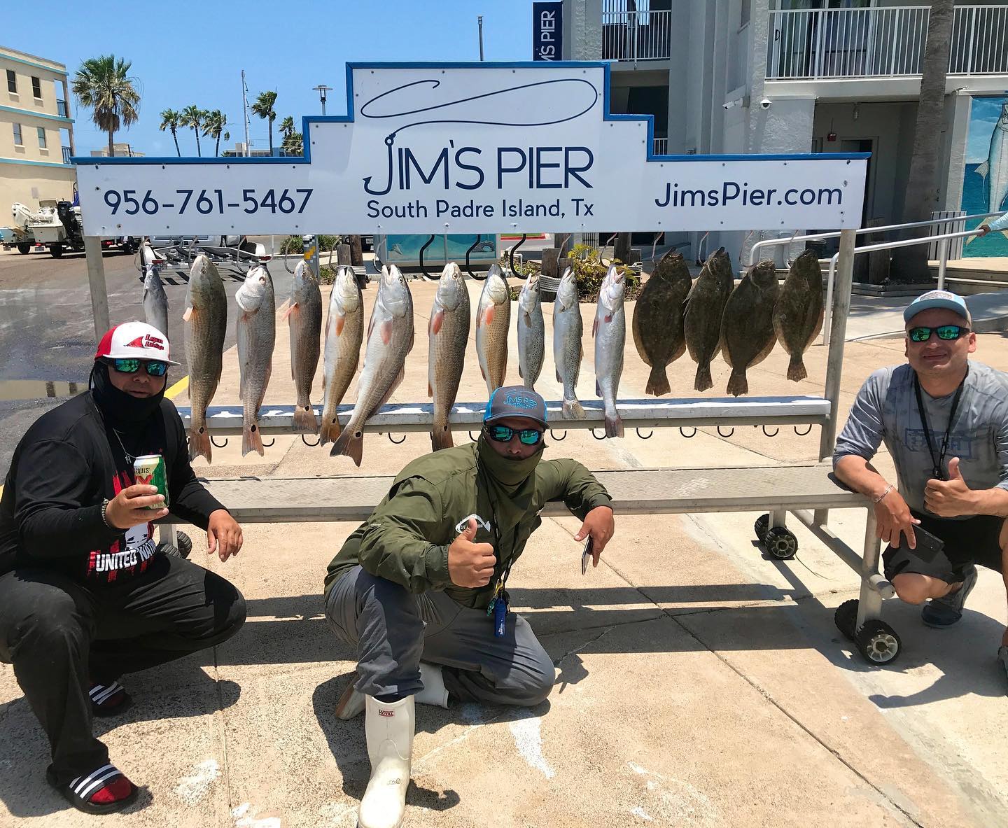 Tournament angler presenting a fish near Jim's Pier